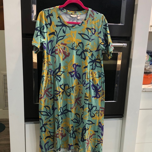 LOGO by Lori Goldstein Dresses & Skirts - Beautiful Fall dress by Logo -
Size SM but definitely fits larger!